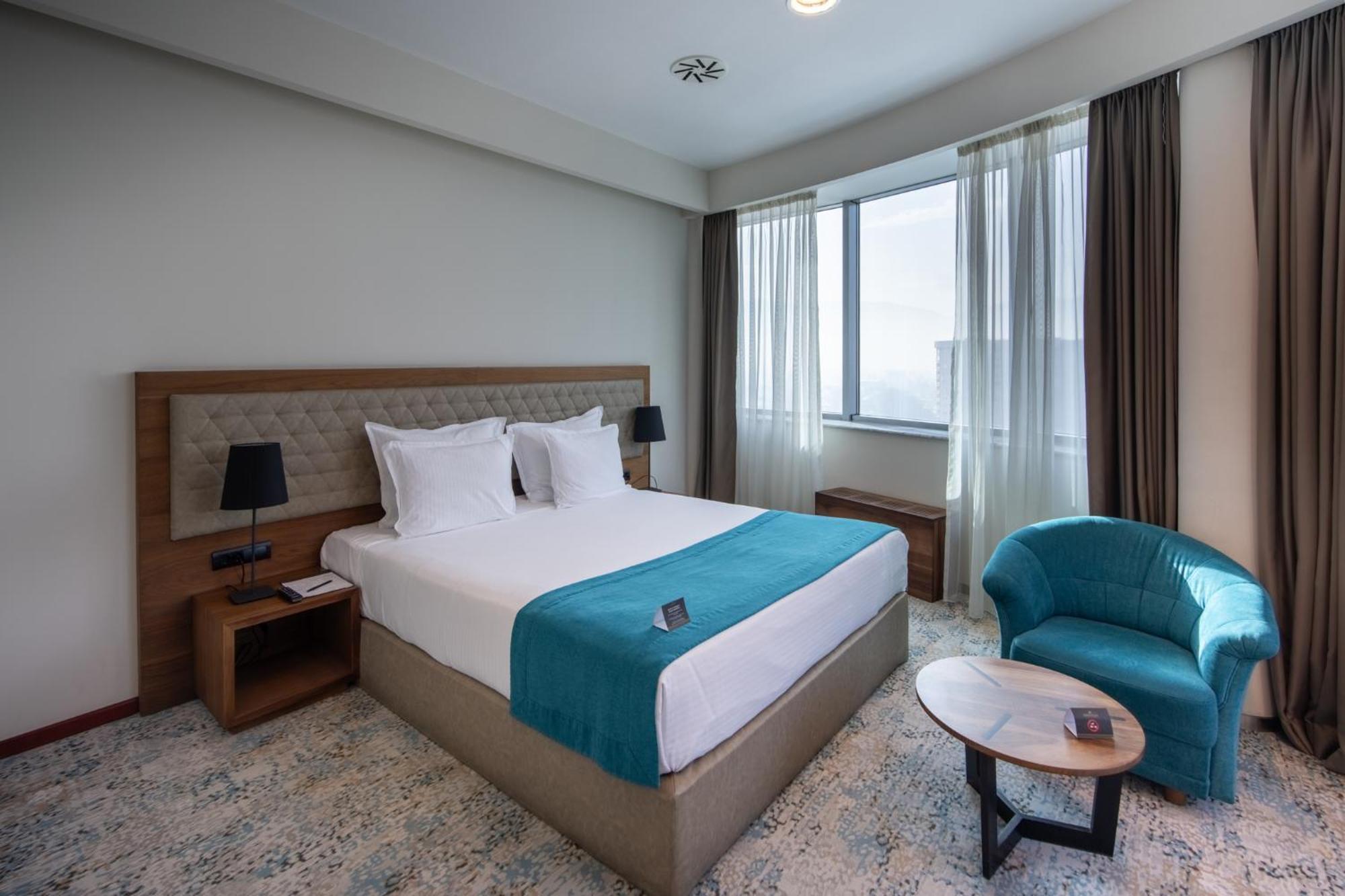 Radon Plaza Hotel Sarajevo Exterior photo A bedroom at the hotel
